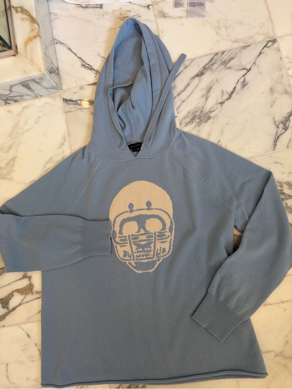 Skull Cashmere Light Blue Crewneck Hoodie with Cream Skull Graphic